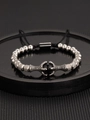 Gothic beaded bracelet with silver dragon claws holding a black agate stone and cord - Steel Color Dragon Claw Bracelet