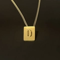 18K gold-plated stainless steel necklace with square letter D pendant on black background - Pendant Only / Letter D
