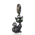 Detailed view of a black metal cat pendant with green eyes and sparkling black crystals - CCT246-Pave Black Cat