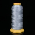 Strong grey braided nylon thread on yellow spool for jewelry making and bead stringing - 3 Strands / 1000m / Silver Grey