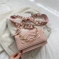 Pink chevron quilted crossbody bag with golden floral chain and wide printed strap - Pink