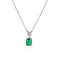 Macro shot of a silver necklace with emerald cut green gemstone and zircon accents - White Gold Emerald Green Square Necklace
