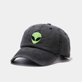 Close-up of vintage washed grey cotton baseball cap with green alien head embroidery - Black Alien Rainbow Lens