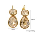 Detail of drop earrings with cushion and pear-cut champagne crystals in golden finish - Light Yellow Zirconia