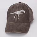 Detailed view of dinosaur skeleton embroidery on washed brown cotton baseball cap - 48-53cm (2-8 Years) / Coffee