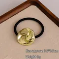Golden knot geometric metal hair tie with high elasticity black band, 3.5x3.5cm size - Twist Knot Gold
