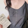 Detail of silver bowknot y-shaped lariat necklace with fringe and teardrop pendants - 28# Necklace - Silver - Long Tassel Bow