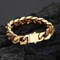 Detail van 12 mm gouden cubaanse armband met zirkonia kristallen op donkere steen - 23CM / Goud