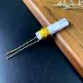 Detail of a gold U-shaped hair pin with white marble stone and hand-wrapped wire accents - White Turquoise