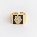 Detailed view of gold Hamsa Hand ring with black enamel inlay and cubic zirconia stones - Adjustable Open / Black