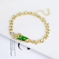 Detail of flower links and St. Jude pendant with green enamel on 18K gold bracelet - Gold Saint Jude Green Enamel