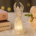 Luminous acrylic angel figurine with warm LED lights on a decorative tabletop - Small Instrument Angel (Warm Yellow Light)