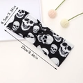 Crossed elastic sports headband with white skull pattern for Halloween yoga workout - Black White Skull