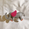 Detail of grey leather elephant pendant with pink wings and orange accents with fine stitching - Back Clip Only / Gray