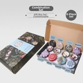 Detail of 8-piece soy wax candle gift set with dried flowers in colorful tin jars - Style B (8-Piece Gift Set)