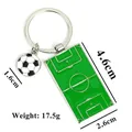 Detail of soccer field keychain with enamel football pendant and precise dimensions - Soccer Field