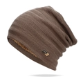 Bonnet en tricot marron foncé avec motif chevrons, doublure polaire et logo en métal - Taille unique / Fauve