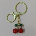 Red crystal resin cherry keychain with green enamel leaves and golden metal lobster clasp - Gold Lobster Clasp Solid Red Cherry (Two Leaves)