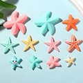 Set di accessori a forma di stella marina in resina colorata per fai-da-te e capelli - Multicolore