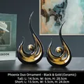 Modern abstract ceramic phoenix sculptures in black and gold for luxury home decor - Phoenix Flight - Black Gold Pair