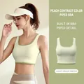 Women's seamless light green yoga sports bra with contrast piping and elastic fit - S / Light Grass Green Bra