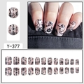 Short pink gradient press-on nails with black flower patterns and model view, set of 24 - Nude Pink Black Floral Pattern (Y-377)