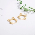Macro detail of gold cat ear hoop earrings featuring minimalist design and metallic luster - Hollow Cat Earrings-Gold