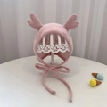 Detail of pink knitted baby hat with cute 3D heart accents and soft ribbed texture - 40-48cm / Pink