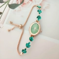 Elegant gold bracelet watch for women with green leaf crystals and adjustable chain strap - Green
