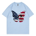 Light blue crew neck T-shirt featuring a butterfly print with American flag and flower wings - Light Blue 317 / XS