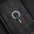 Detail of beaded ring with iridescent gems and a delicate gold feather charm pendant - Green Bead Feather Style (F-R584)