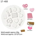 Mini silicone mold featuring assorted cookie, heart, and croissant shapes for DIY crafts - Gray
