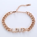 Pulsera de cadena cubana en oro rosa con letras LOVE y cristales brillantes - Oro rosa