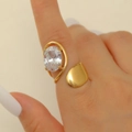 Adjustable gold plated stainless steel ring with oval zircon and asymmetric wrap design - Oval Zircon Asymmetric Wrap Gold Style (1601)