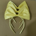 Three yellow satin bow headbands for girls with silky shine on corrugated background - Satin Bow / Yellow