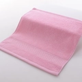 Soft pink cotton hand towel with absorbent loops and decorative honeycomb border - 34x34cm / Princess Pink