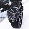 Men's black quartz sport watch with blue stitching and three-eye dial on a studio background - Blue