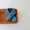Soft blue knitted baby scarf with ribbed texture in a cozy cross-loop style - Solid Color-Blue