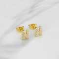 Elegant gold letter N stud earrings set with white cubic zirconia on marble base - Letter N