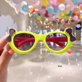 Kids heart bow sunglasses in neon green with white polka dots and red temples - Fluorescent Polka Dot