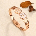 Rose gold heart bangle with hollow floral accents, white enamel, and crystal inlay - Rose Gold
