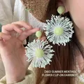Macro view of hand-woven mint green and beige floral earrings with textured fibers - 1# Steel Pin-Light Green (HE24970)