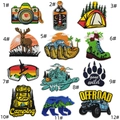 Detailed close-up of 12 distinct outdoor camping and adventure themed embroidered patches - Outdoor Camping Patches Set (12 Pieces)