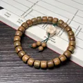 Bracelet en bois de santal brun foncé avec fleur en bois beige et cordon vert - Ébène Bague Ancienne avec Perle à Motifs 10x11mm