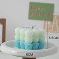 Artistic rose petal scented candle with blue and green gradient finish and ribbon - Rose Cube (Deep Sea Breath)