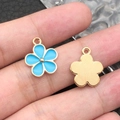 Blue enamel flower pendant with golden stamen and textured metal backing detail - 1Pc Lake Blue Flower 14x17mm