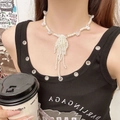 Elegant white pearl tassel necklace with transparent beads worn by a model in casual style - Sweet Cool Style Artificial Pearl Tassel Pendant Necklace (X4401)