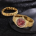 Close-up of gold-plated iced-out watch with red dial and matching diamond bracelet - Gold Red Dial + Gold Cuban Bracelet