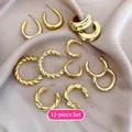 12-piece gold hoop earring set with smooth twisted and wide open band designs - 12pcs Set / Gold