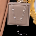 Double-layered silver titanium steel necklace featuring multiple heart-shaped pendants - Double Layer Heart / Steel